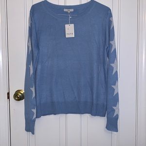 Light blue Fate sweater, with star sleeves. Large